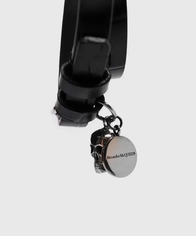 Alexander McQueen Black leather bracelet in two folds with embossed crocodile skin with branded pendants