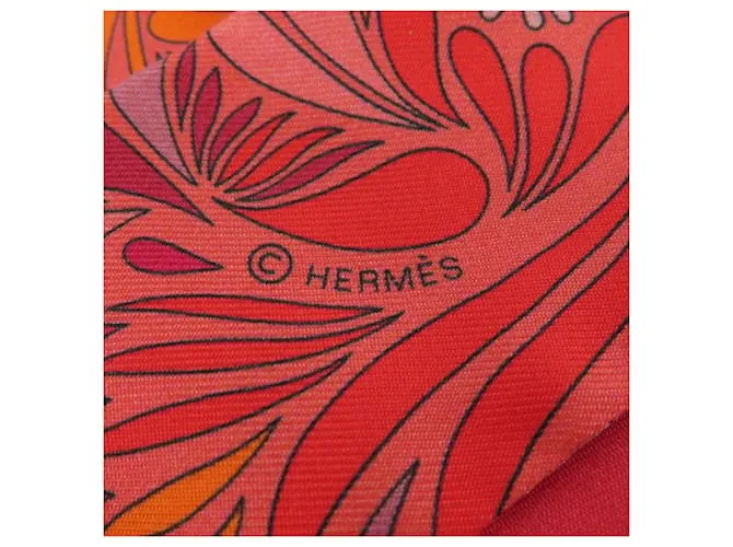 Bufanda Twilly de Hermès en seda roja 