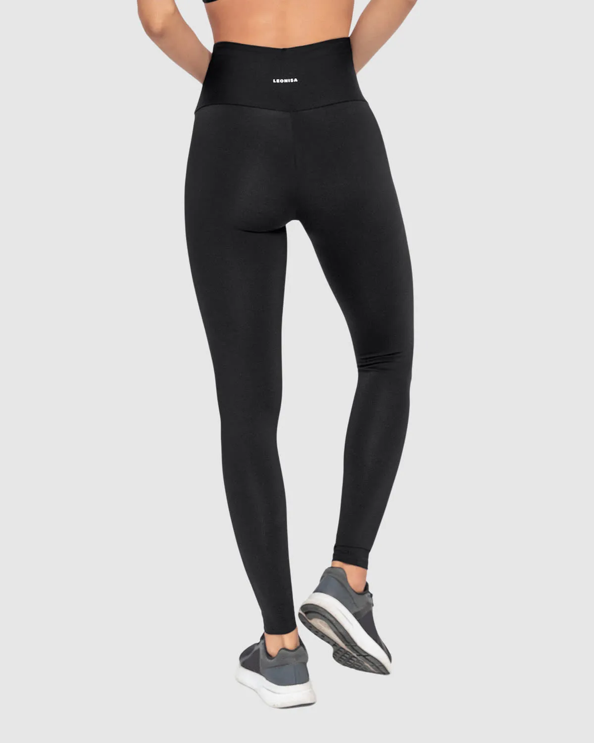 Legging deportivo de compresión con pretina cruzada en forma de V