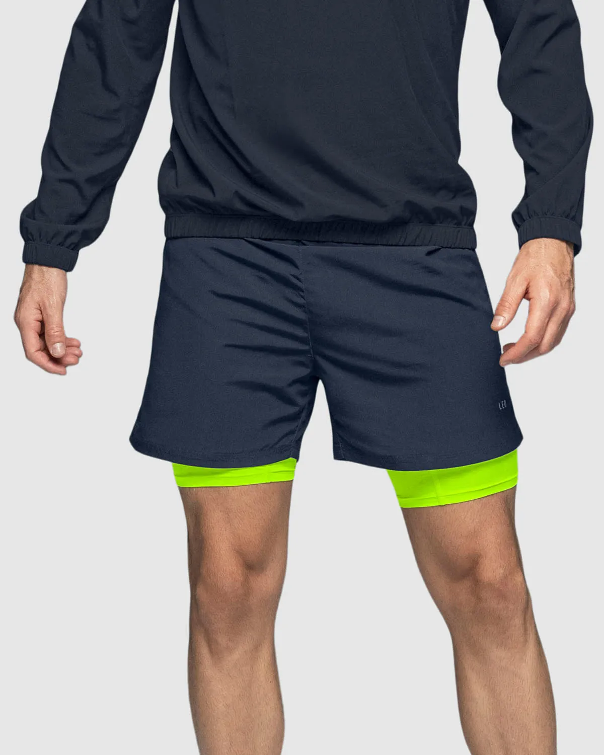 Pantaloneta deportiva con bolsillo lateral con bóxer interno